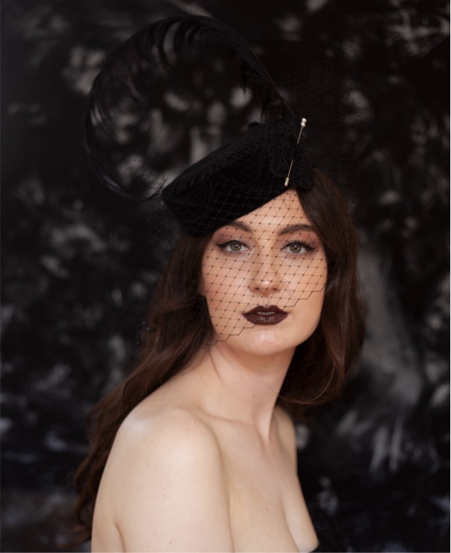 Pillbox whit veil hat