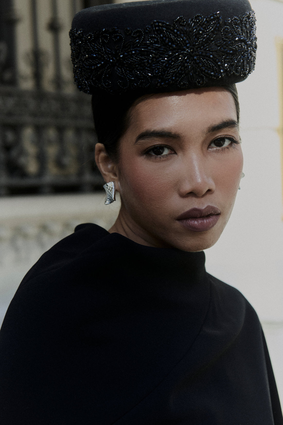 A couture embroidered pillbox hat, handcrafted with precision and intention — where tradition, craftsmanship, and quiet elegance meet
