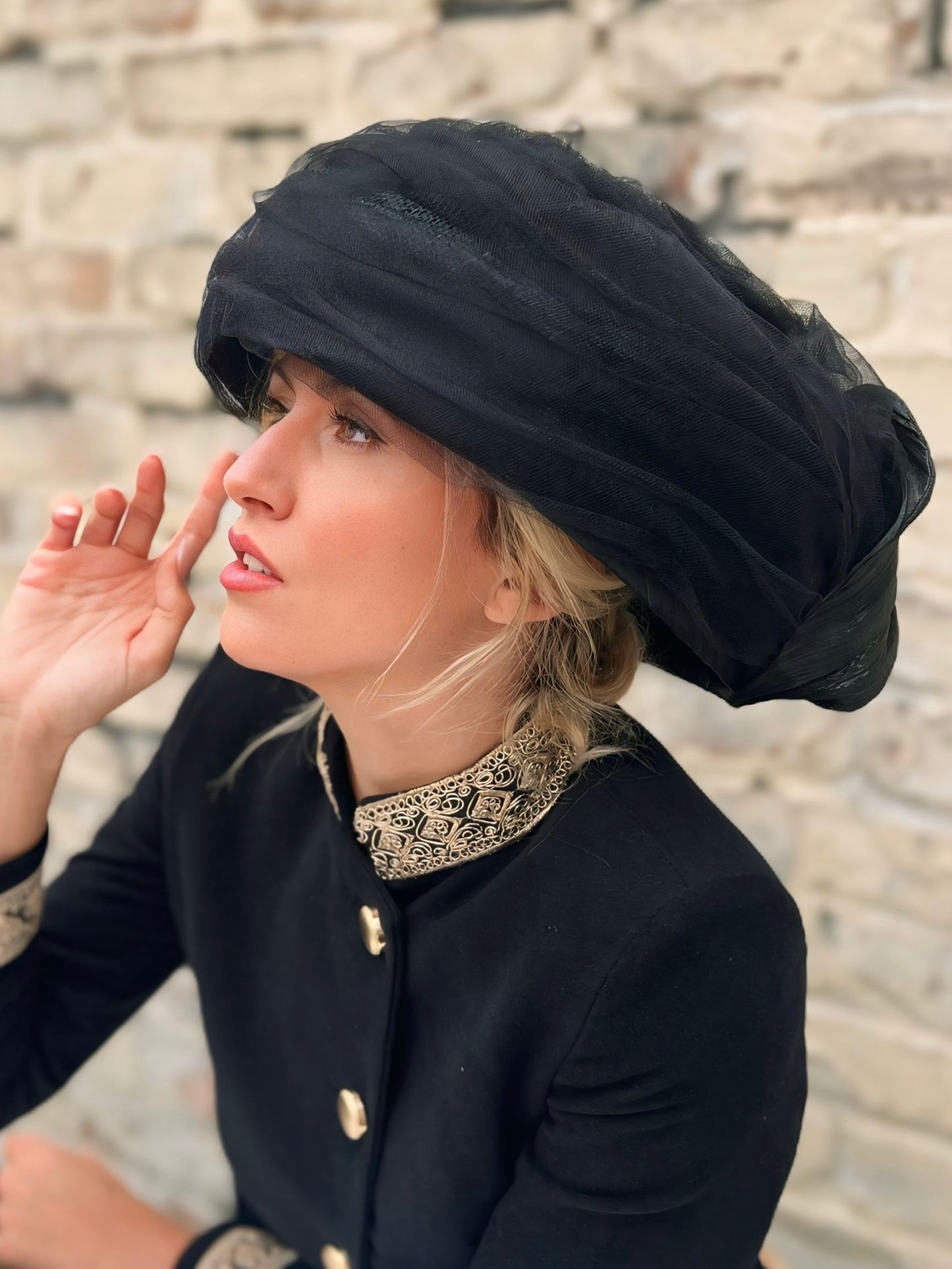 Irina   Tulle and silk in this wonderful vintage-inspired hat. It is held in place with a thin headband and a very fine elastic band for easy attachment.