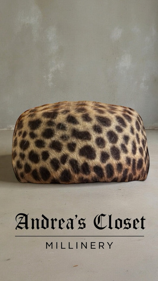 *Sazch – Leopard Fur Felt Pillbox Hat*  
A classic design with attitude.

I