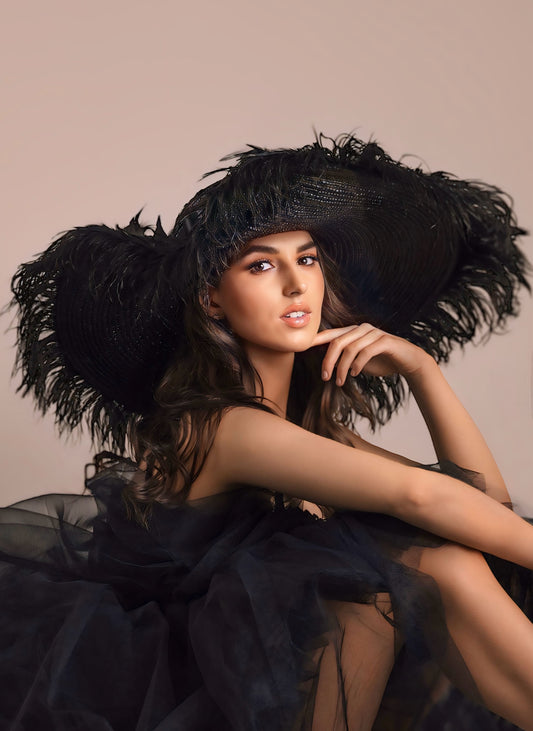 A _Anou  oversized Black Feather Hat