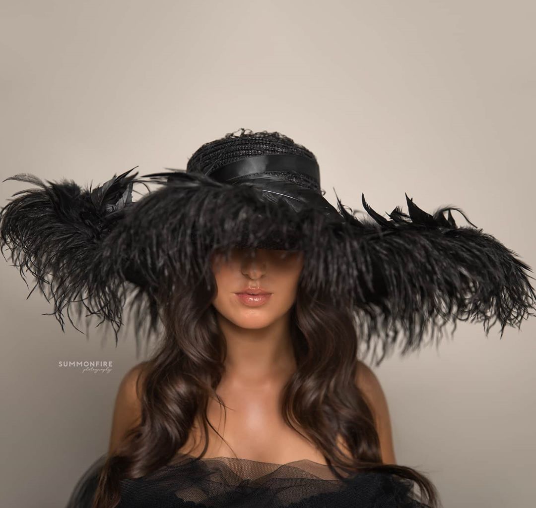 B -Oversized Black Feather Hat