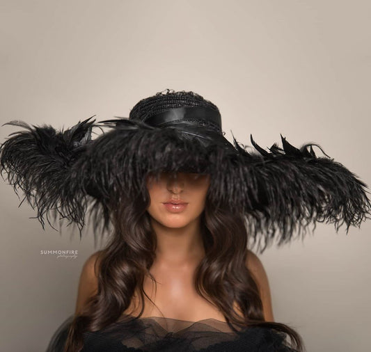 A _Anou  oversized Black Feather Hat