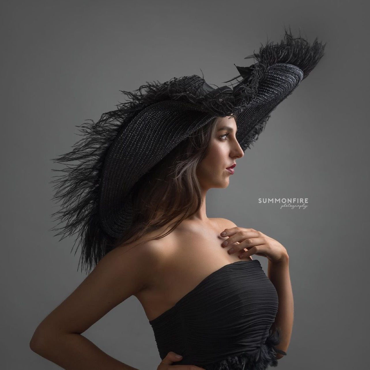 A _Anou  oversized Black Feather Hat
